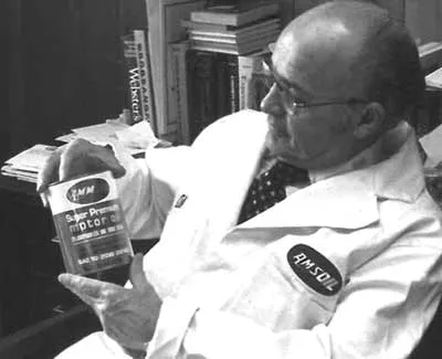 Al Amatuzio holding a can of oil