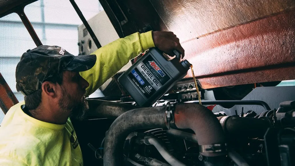 Jimmy Henderson Commercial Builder using AMSOIL Diesel Oil to protect his equipment
